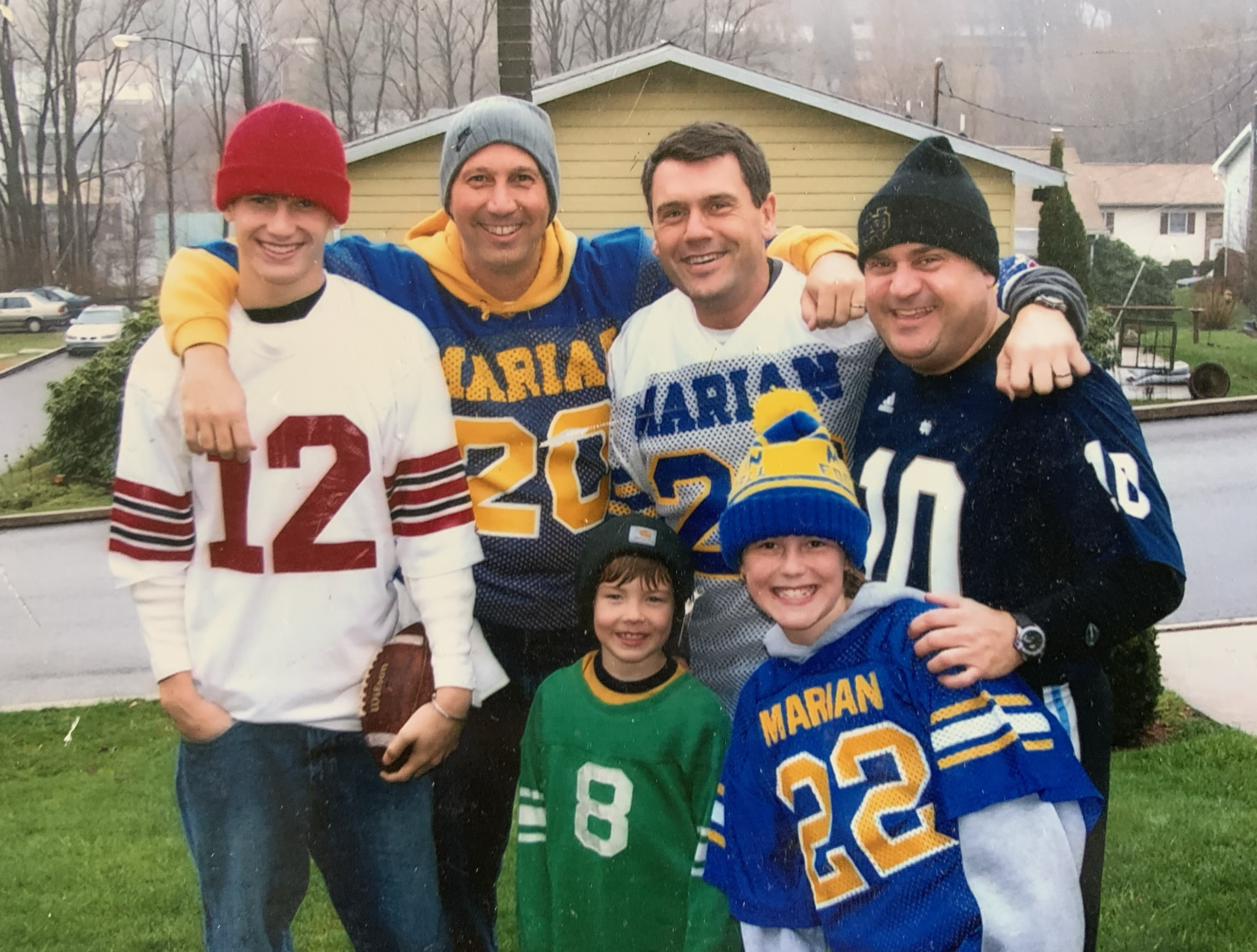 John on the water, laughing with family
